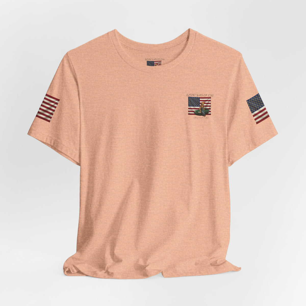 peach Mr. Blunt patriotic tee laid out with small chest graphic and American flag sleeve prints.