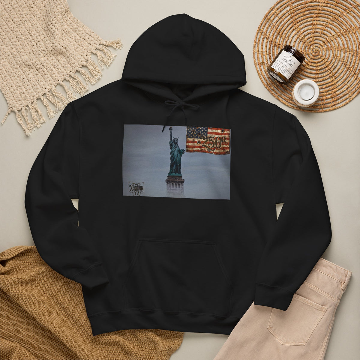 Statue of Liberty flag hoodie featuring misty skyline and American flag design on a cozy black sweatshirt.